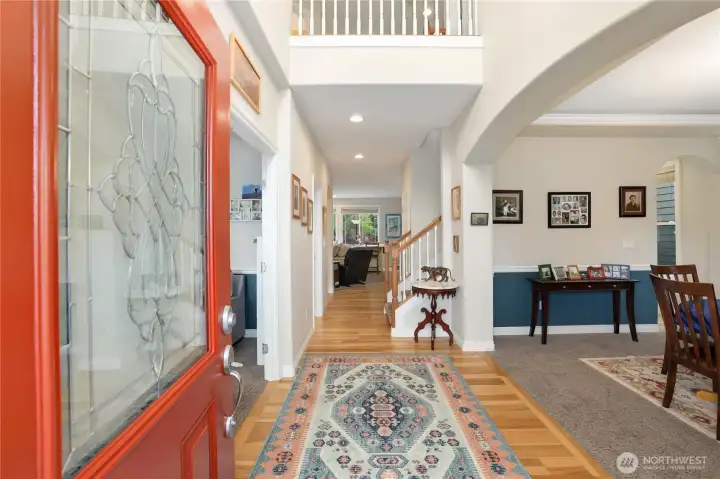 Vaulted entry with lots of natural light