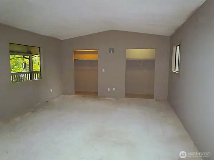 Primary bedroom, Oh and check out the two closets, you wont have to fight for space.