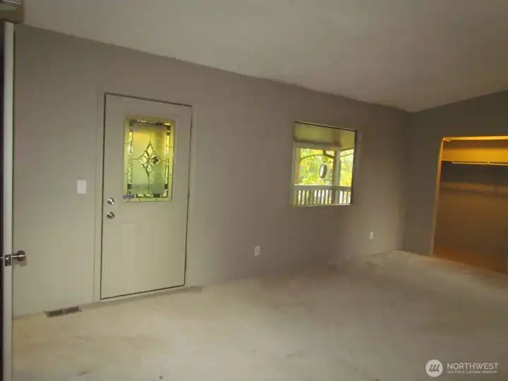 Here is the door to your own covered private deck for that morning cup of coffee, or relaxing evening beverage.