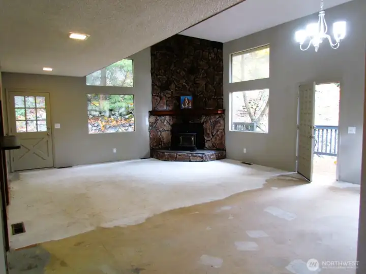 View from the Primary Suite, bathroom is off to the left and there are stairs that go to the lower level on the right.