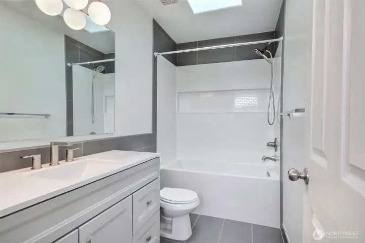 Second floor full bathroom has been remodeled with a new tub and fixtures