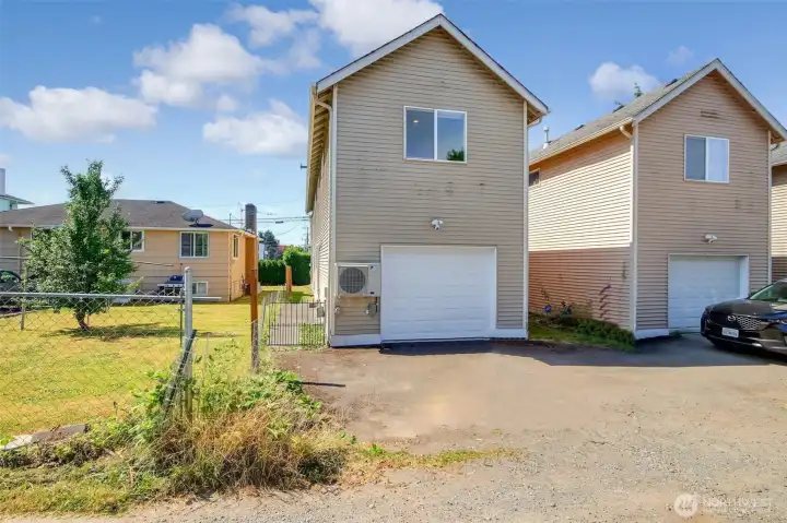 Single car garage plus room to park another car outside