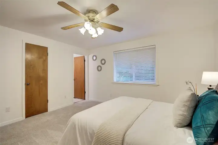 Door next to the window leads into the primary bath.