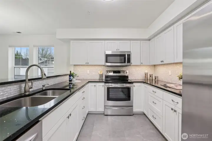 Newer kitchen, new flooring and light.