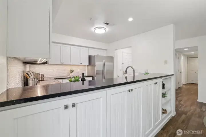 Extra cabinetry storage on dining side