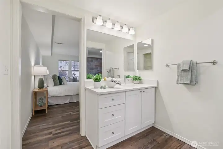 New countertops, sink and faucet in primary bathroom