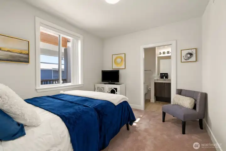 The junior primary suite spoils your guests with their own bath and large walk-in closet. *Virtually staged*