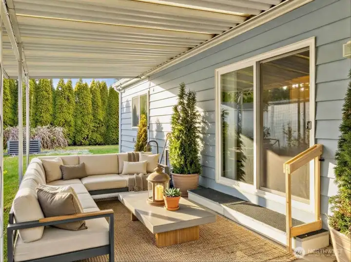 Welcome to your amazing covered outdoor patio directly off the partially fenced backyard! Plenty of space to entertain and enjoy rain or shine. Slider leads directly into large living space and into kitchen for great indoor-outdoor living!