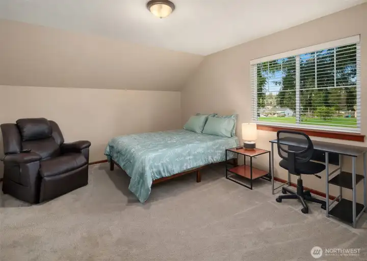 Cool 2nd bedroom with unique ceiling makes for an imagination playground! This room is really large and has a closet that is the same lenth as the room! Truly a twin bed could fit into the closet...