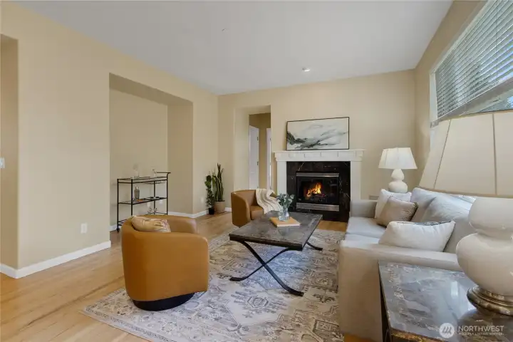 Living room with gas fireplace and seamless connection to the kitchen