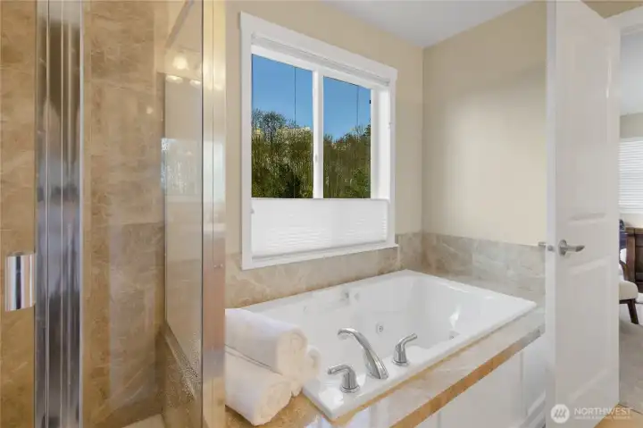 Relax in the soaking jetted bathtub