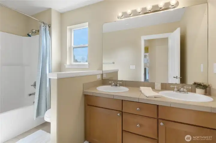 Main bathroom features a dual vanity for added convenience Main bathroom features a dual vanity for added convenience