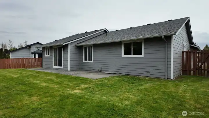 View of fully fenced back yard