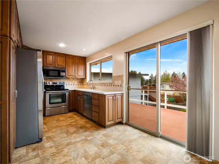 The best attribute of the well-appointed kitchen is the sweeping view of the Cascade Mountain. From the deck, Mt. Rainier is also visible.