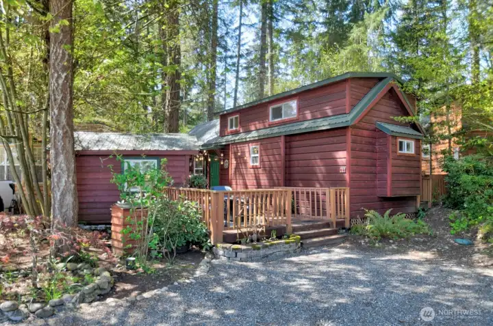 18 OAK CABIN WITH SHED TUCKED IN THE WOODS OF LOST LAKE