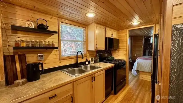 ALL NEW APPLIANCES, REFRIGERATOR, DISHWASHER, MICROWAVE, PROPANE COOKING STOVE.