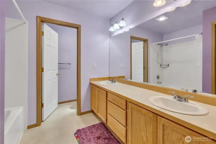 Spacious primary bath with dual sinks.