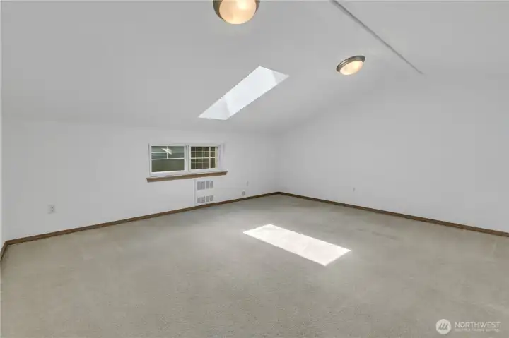 Spacious bonus room with natural light
