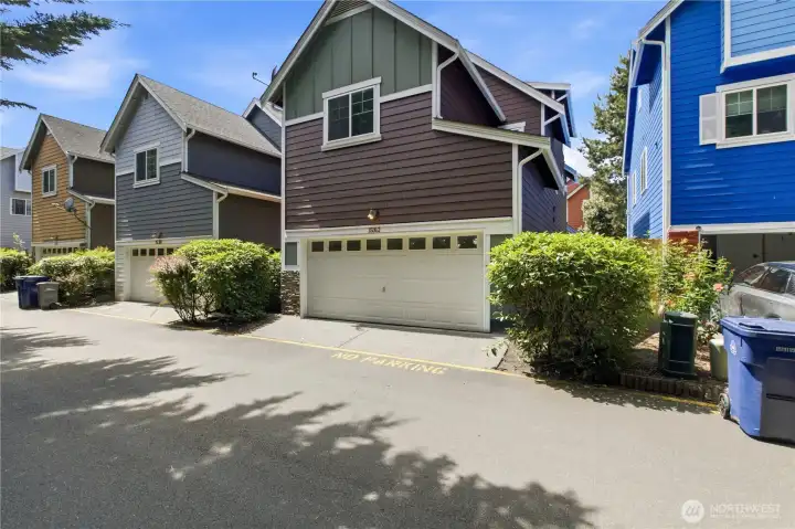 Two car garage with high ceilings and storage to spare!