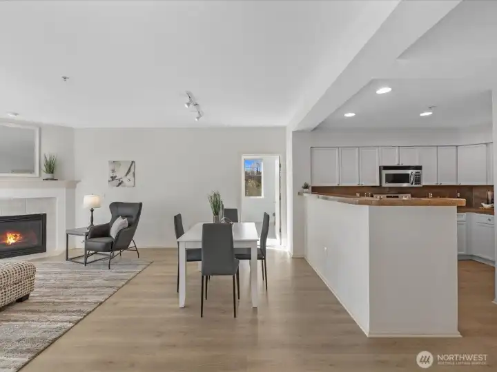 Dining area with open connection to kitchen and living spaces, providing functional flow for everyday living and entertaining. Dining area with open connection to kitchen and living spaces, providing functional flow for everyday living and entertaining.