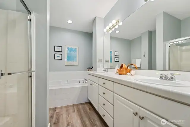 Primary bath with separate shower and large soaking tub