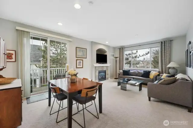 Fabulous light filled great room offers ample dining and living space