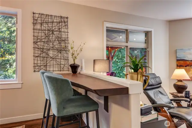 Custom raw-edge sitting area overlooking the family room.