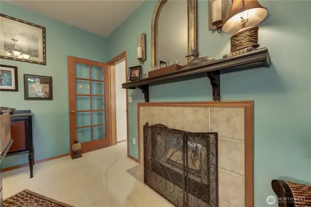 Two-sided fireplace adds elegant to the rec room/bonus.