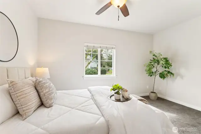 spacious with a ceiling fan.
