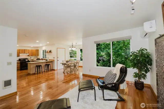Open concept family room, dining room and kitchen