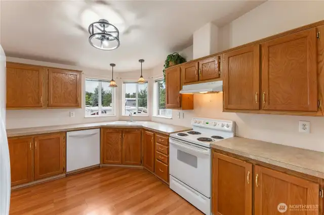 Second view of large kitchen for cooking entertaining