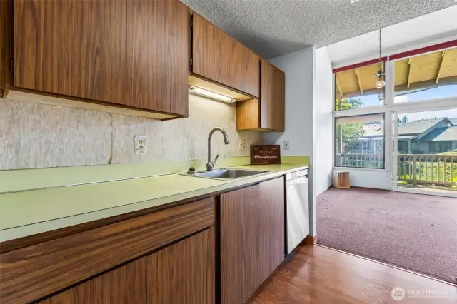 The kitchen is fully functional. Nice faucet and decent appliances including a W/D combo that is great!
