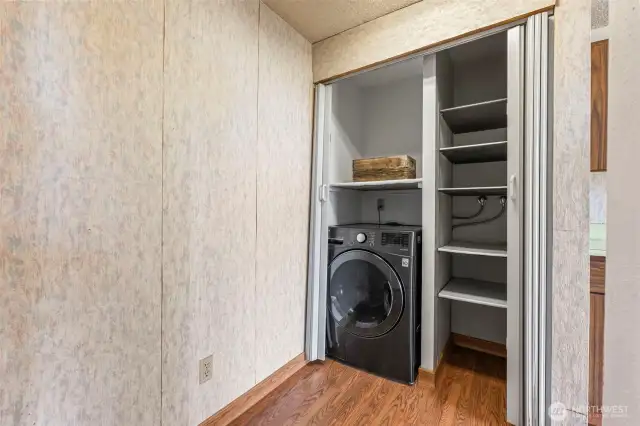 As promised...the pantry and W/D combo. Fairly new and works great....speaking of work...most folks will choose to take the peeling wallpaper down. That is one of the reasons why it is selling AS-IS