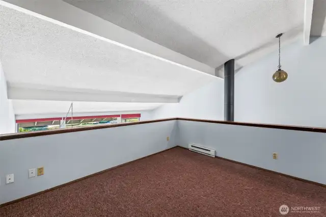 Loft overlooks the LR/DR and enjoys lots of natural light.