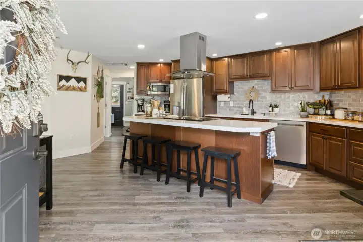 Kitchen with island and eating bar