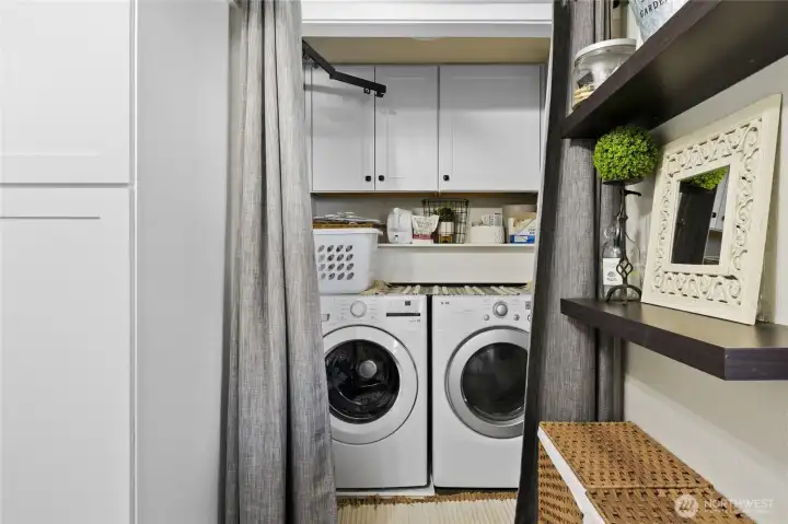 Utility room with storage and office area