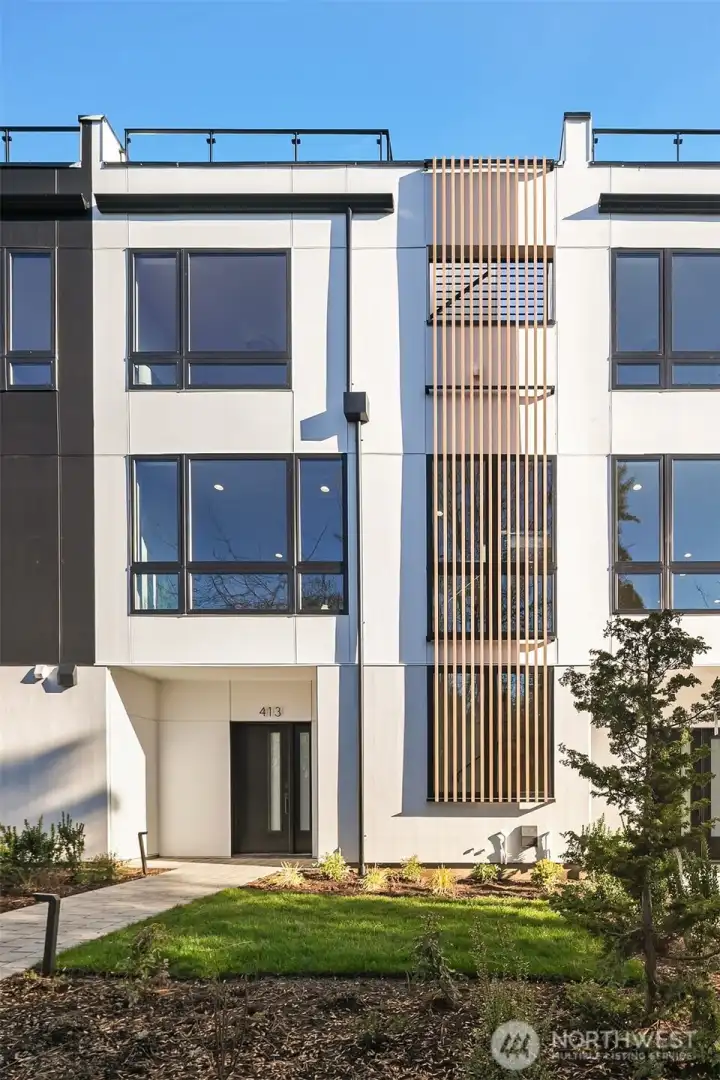 Private street runs along west side of site with guest entrance to 413