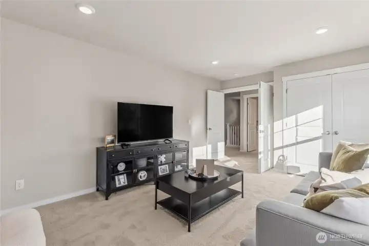 Big bonus room can double as a 6th bedroom with closet. Photo is representational. Actual home is under construction and colors, materials, and finishes may vary. See site agent for details.