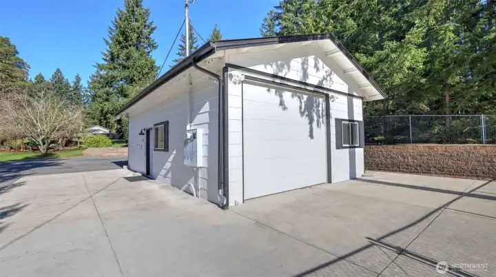 Garage door for easy access. Fenced for privacy