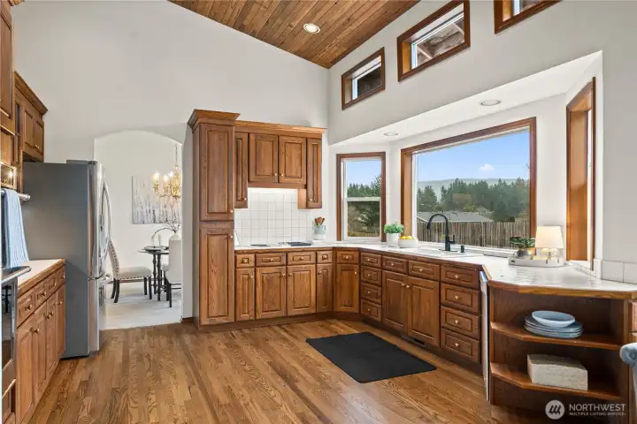 Large kitchen with amble cabinets.