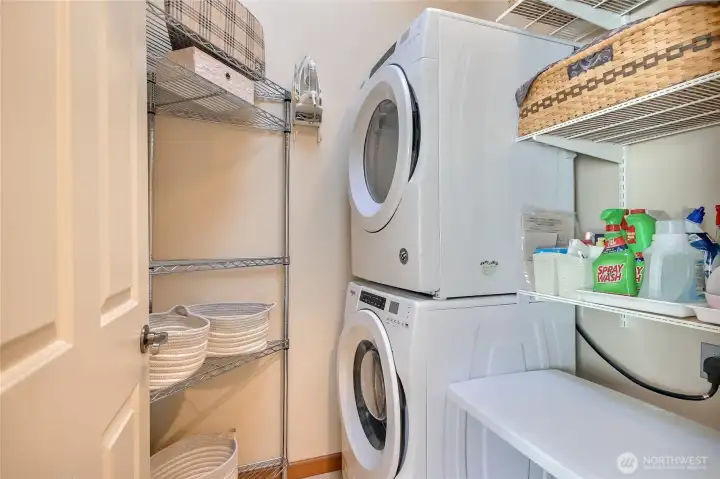 The laundry room is on the upper level and strategically designed to maximize the space.