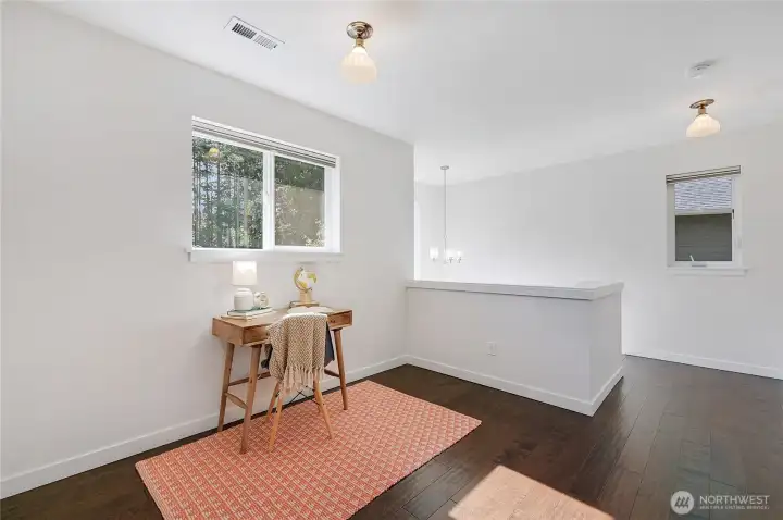 Flex space which can easily be used as an office, playroom, media area, etc.