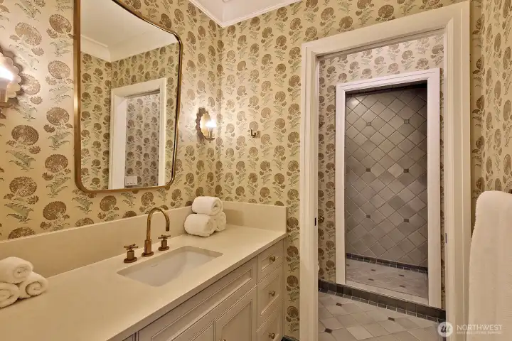 Guest bedroom en-suite bath with walk-in shower.