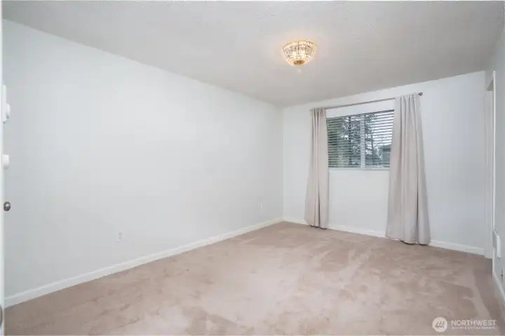 Enjoy the primary bedroom with an attached en-suite bathroom.