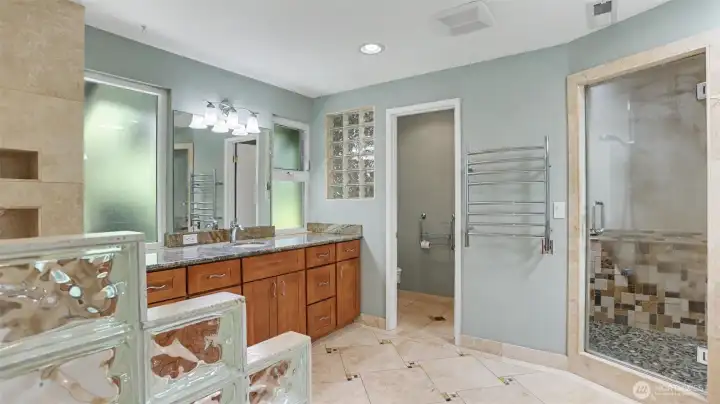 Steam shower and heated floors.
