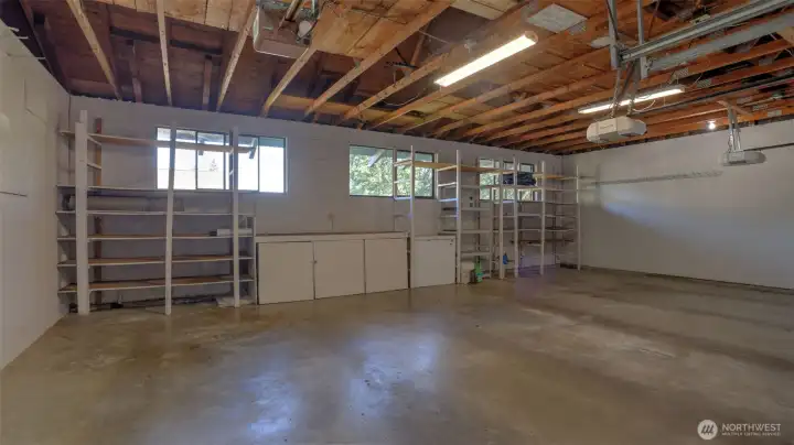 Large 3 car wide garage.