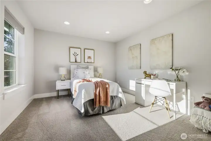 Secondary bedroom with ample natural light.