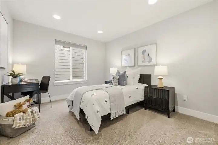 Another one of the five spacious bedrooms.