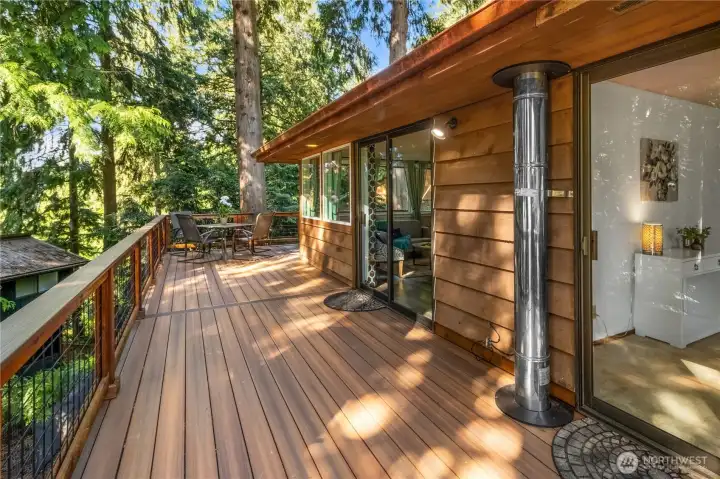 Private deck access from the primary bedroom