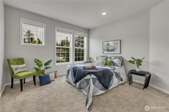Spacious Guest Bedroom Facing the Street; One of Three Additional Bedrooms Upstairs